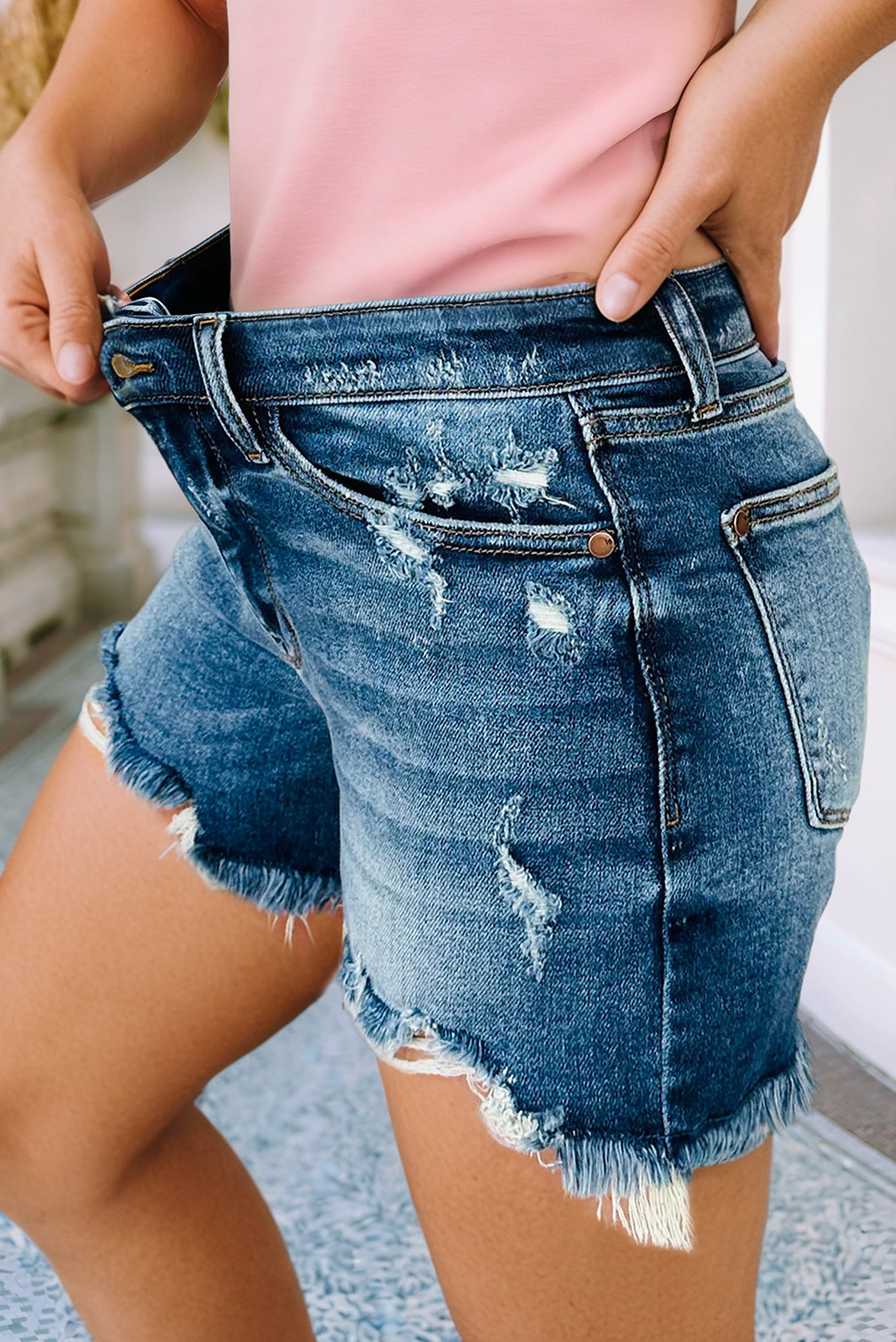 Asymmetric Raw Hem Distressed Whiskery Denim Shorts